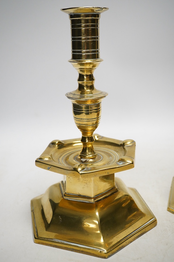 A pair of Dutch style 'Heemskerk' heavy cast brass candlesticks, on hexagonal bases, 24cm. Condition - fair to good